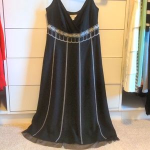 Black dress with stitch and bead detail